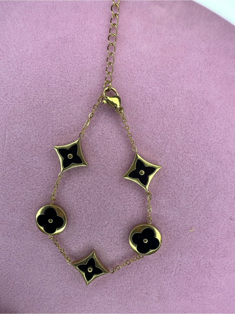 Gold and Black Floral Motif Bracelet